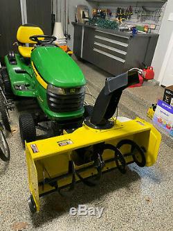 John Deere X324 Lawn Tractor All-Wheel-Steer with leaf collector and snow blower