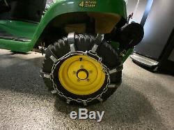 John Deere X324 Lawn Tractor All-Wheel-Steer with leaf collector and snow blower